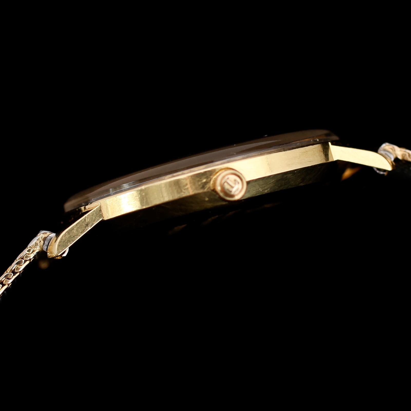 ARMBANDSUR, 18 k guld, Tissot Seastar, 1980-tal, quartz.
