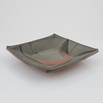 Shoji Hamada, in the manner of, glazed stoneware dish, 20th century.