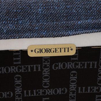 Umberto Asnago, fåtölj med fotpall, "Progetti", Giorgetti, 2000-tal.