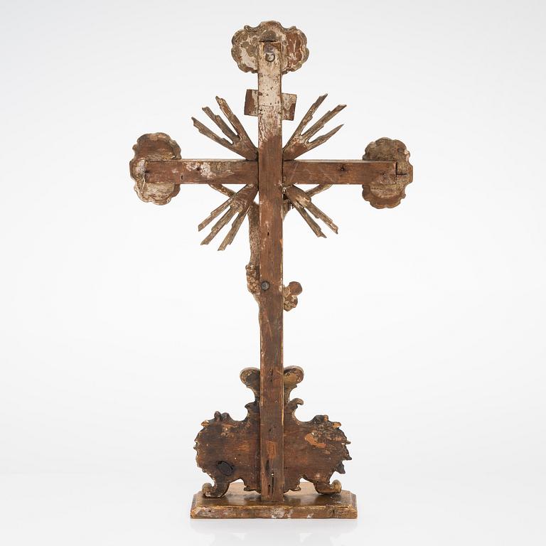 A 19th century gilded and painted wood crucifix.