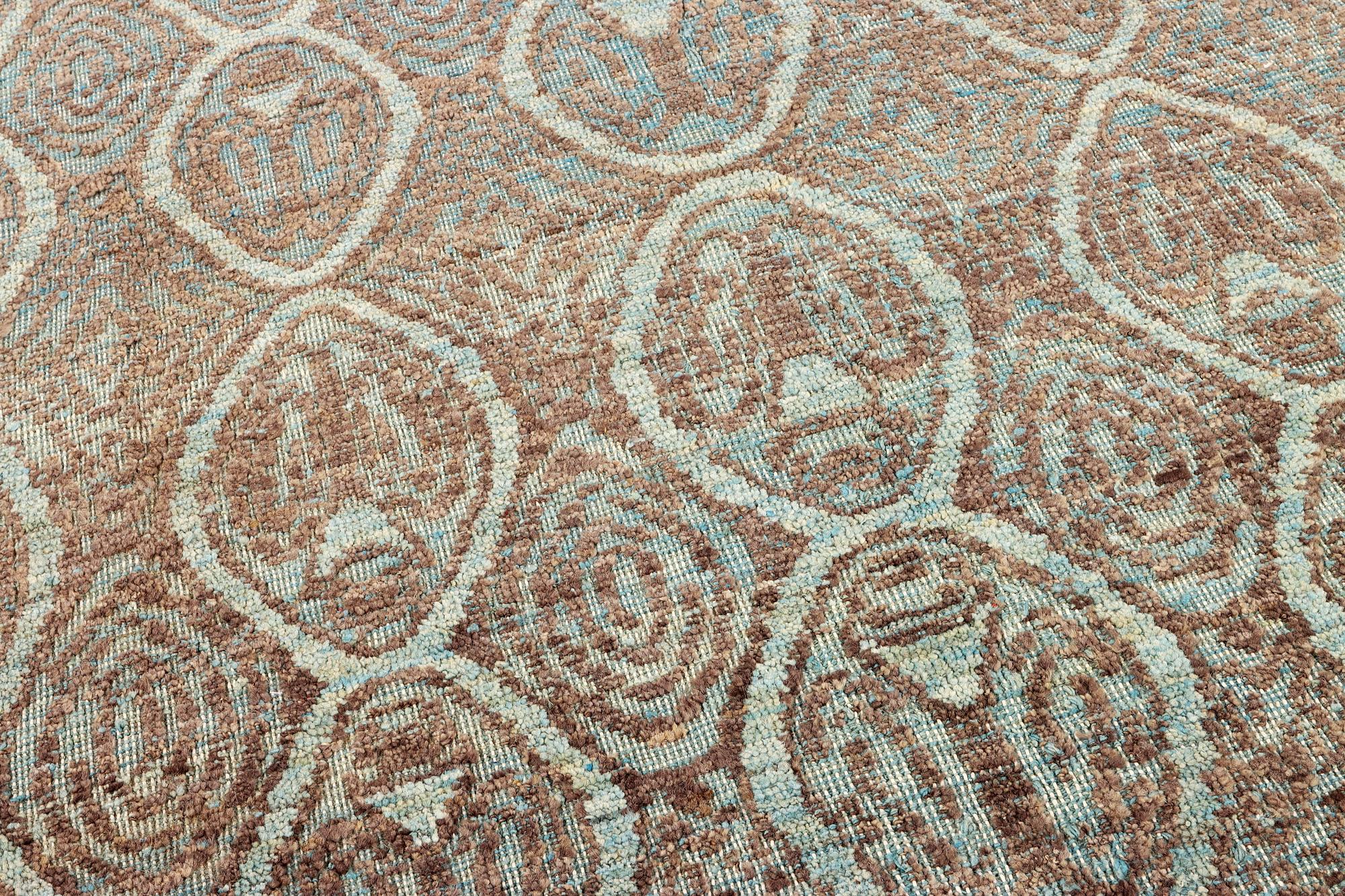 An oriental carpet with modern design, c. 308 x 202 cm.