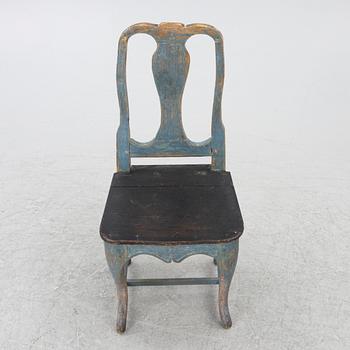 A 19th century  Folk Art chair.