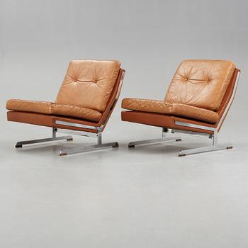 A pair of Poul Nørreklit chromed steel and brown leather easy chairs, Selectform, Denmark 1960's.