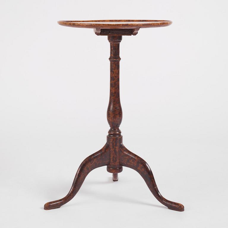 A burr-alder tilt-top table by J. Sjölin (master 1767-1785).