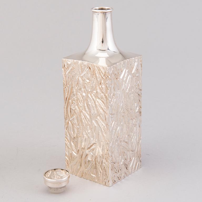 A silver carafe with six parcel-gilt beakers, Auran Kultaseppä oy, Turku 1977.