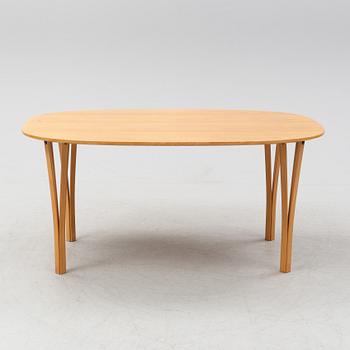 Bruno Mathsson & Piet Hein, a beech tree 'Superellips' dining table, Fritz Hansen, 1983.