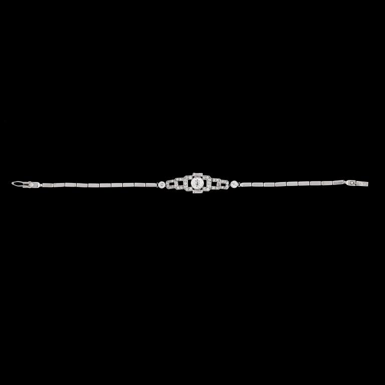 An Art Deco old cut diamond bracelet, app. 1 ct center stone.