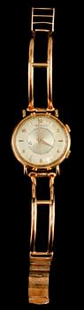 ARMBANDSUR, herr, 18 k guld, Jaeger LeCoultre, "Memovox". omkring 1900-talets mitt. Total vikt 56 g.