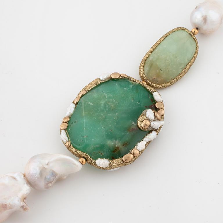 A cultured pearl and chrysoprase 
 and prenite necklace.