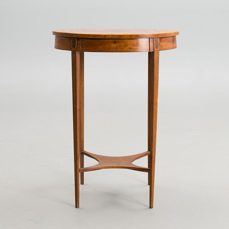 A SEWING TABLE, empire early 19th century.