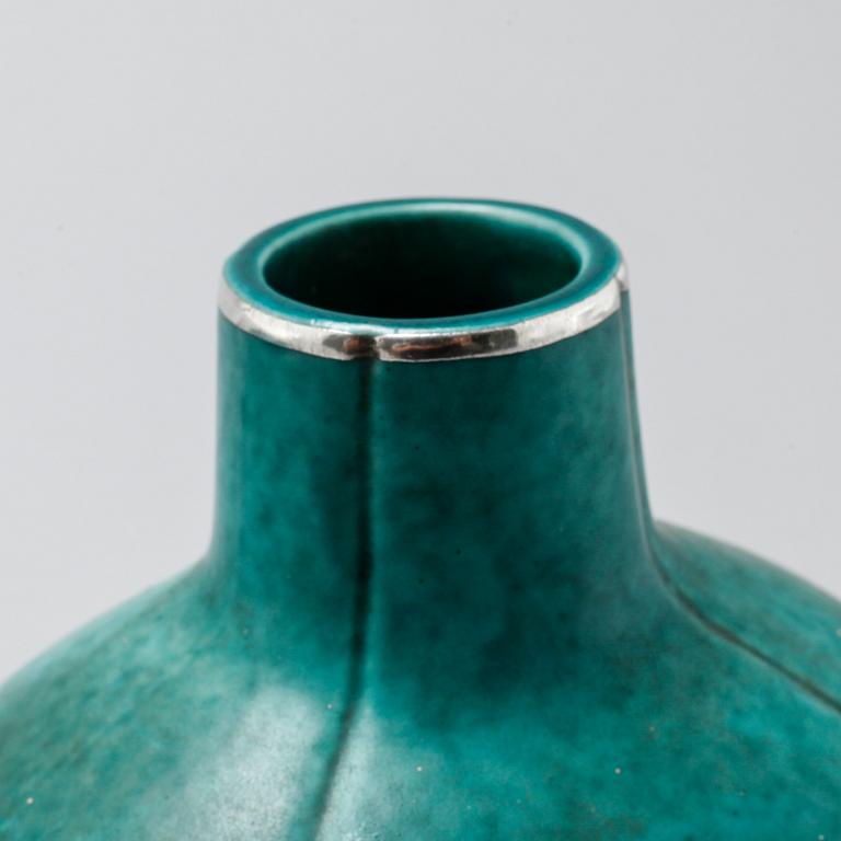 A stoneware vase and a dish by Wilhelm Kåge for Gustavsberg, 20th century.