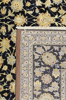 A Keshan carpet, c. 397 x 300 cm.