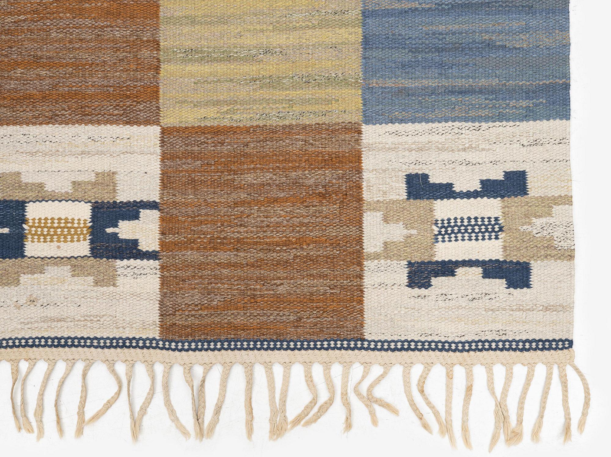 Märta Måås-Fjetterström, a carpet, 'Rutmattan med blått', flat weave, c 235 x 118 cm, signed AB MMF.