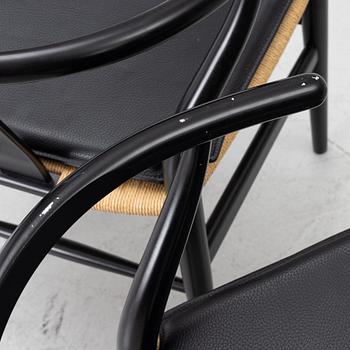 Hans J. Wegner, four CH24/ "Wishbone" chairs, Carl Hansen & Son, Denmark, 21st century.