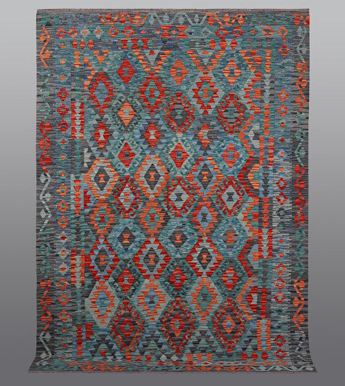 A rug, kilim, ca 252 x 179 cm.