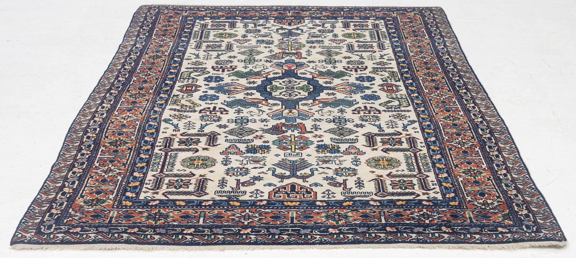 A figural oriental carpet, c. 205 x 134 cm.