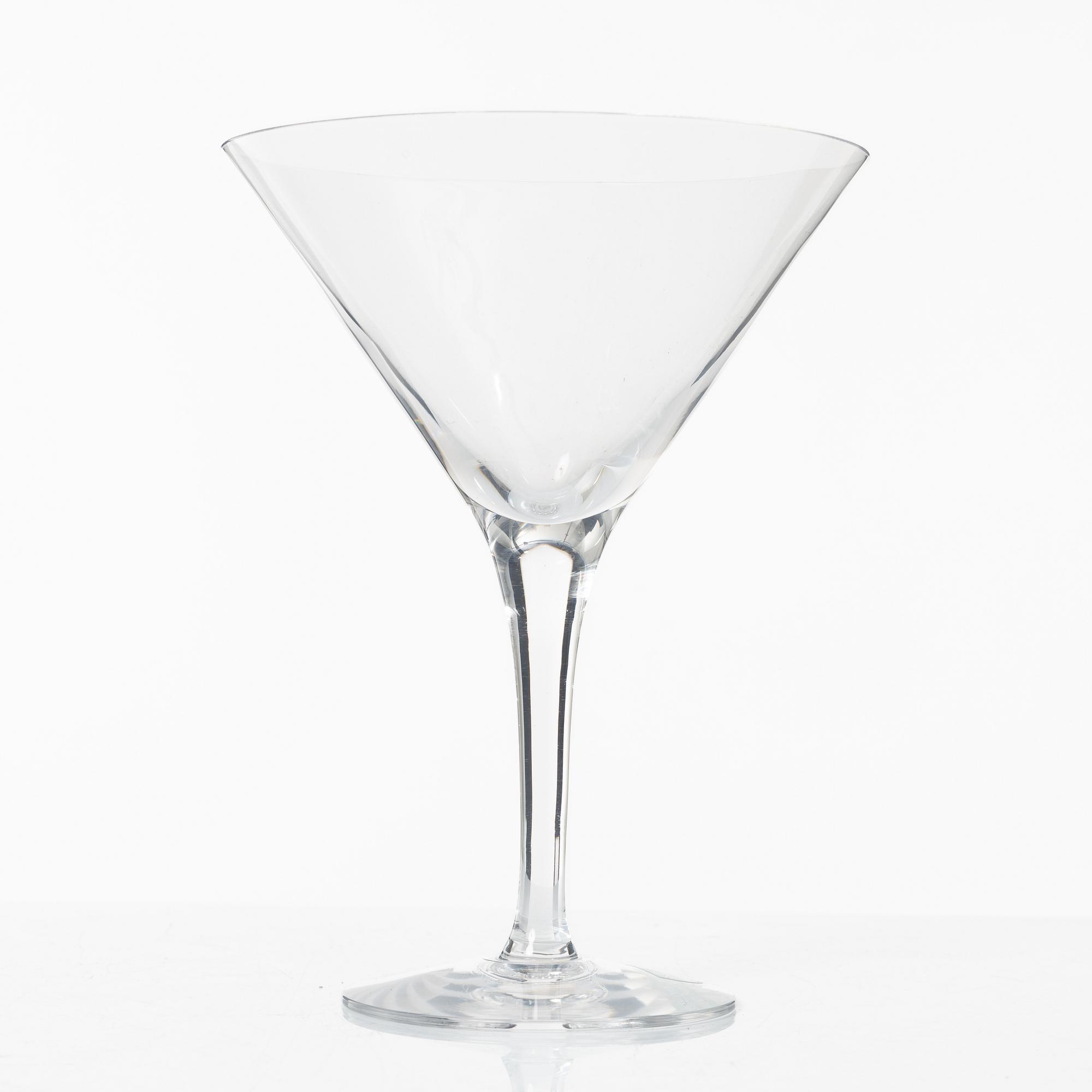 A set of 46 glass service parts, including 'Elixir Connoisseur' and Gunnar Cyrén, 'Optica', Orrefors.