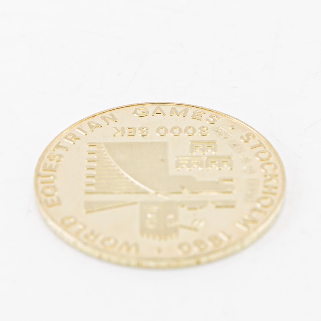 Medalj 18K guld 3000 kr Carl XVI Gustaf, World Equestrian games Stockholm 1990 Sporrong  vikt ca 10,02 gram.