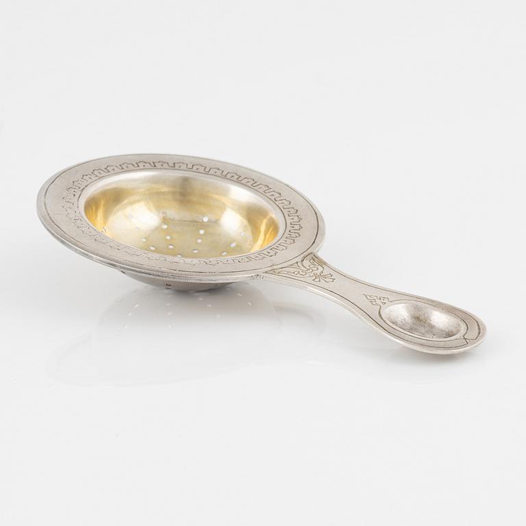 A Russian Parcel-Gilt Silver Tea Strainer, late 19th Century.