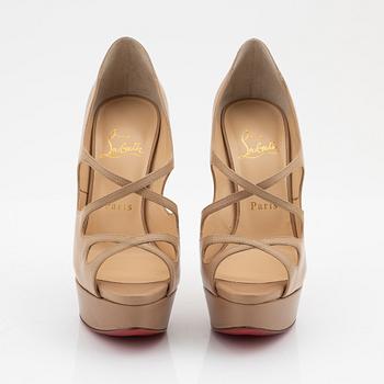 Christian Louboutin, a pair of beige leather sandals, size 37.