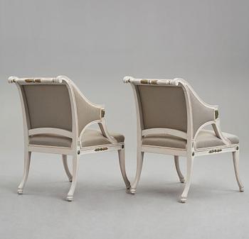 A pair of late Gustavian early 19th century armchairs.