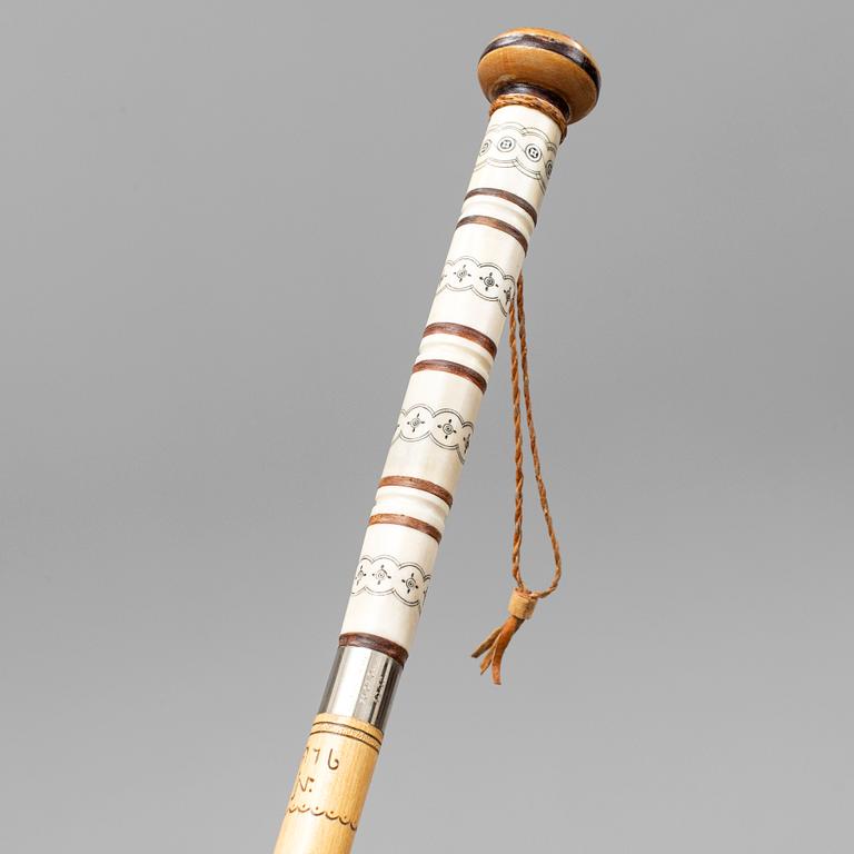 JOHN NILSSON, a Sami birch and reindeerhorn walking stick, signed and dated 1976.