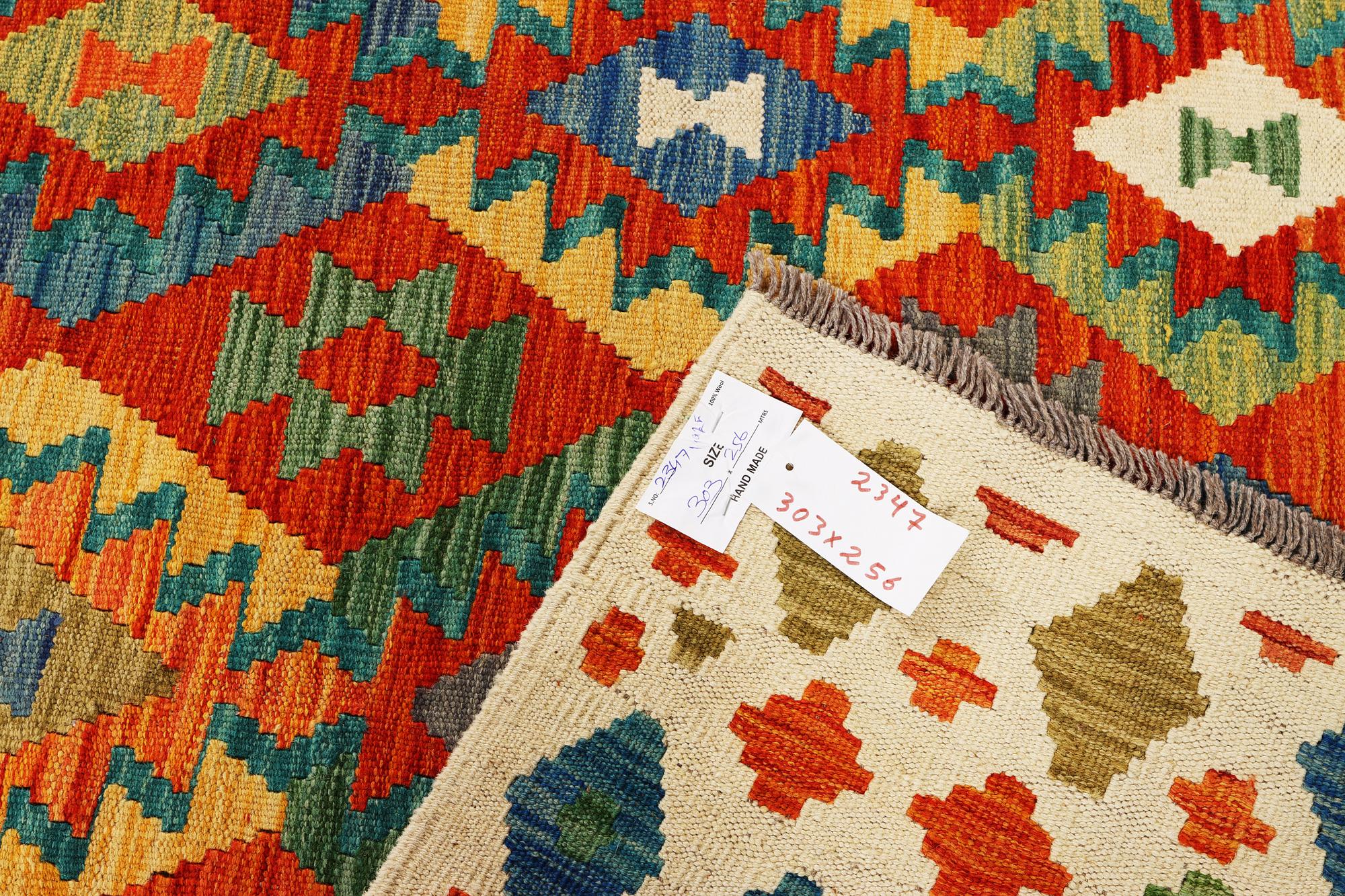 A Kilim carpet, c. 303 x 256 cm.