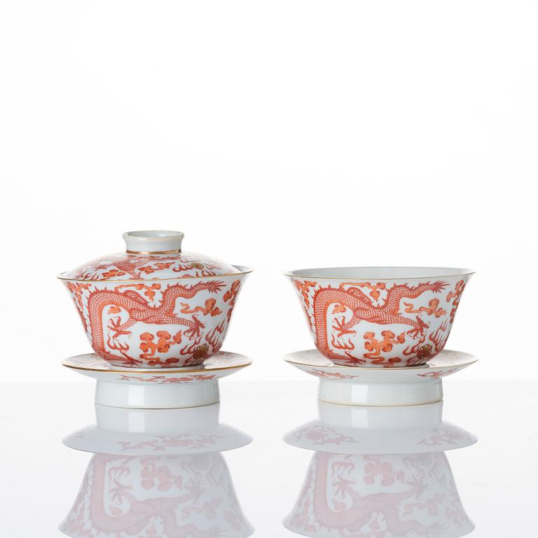 A pair of five clawed dragon bowls on stands and a cover, Qing dynasty, Daoguang mark and period (1821-50).