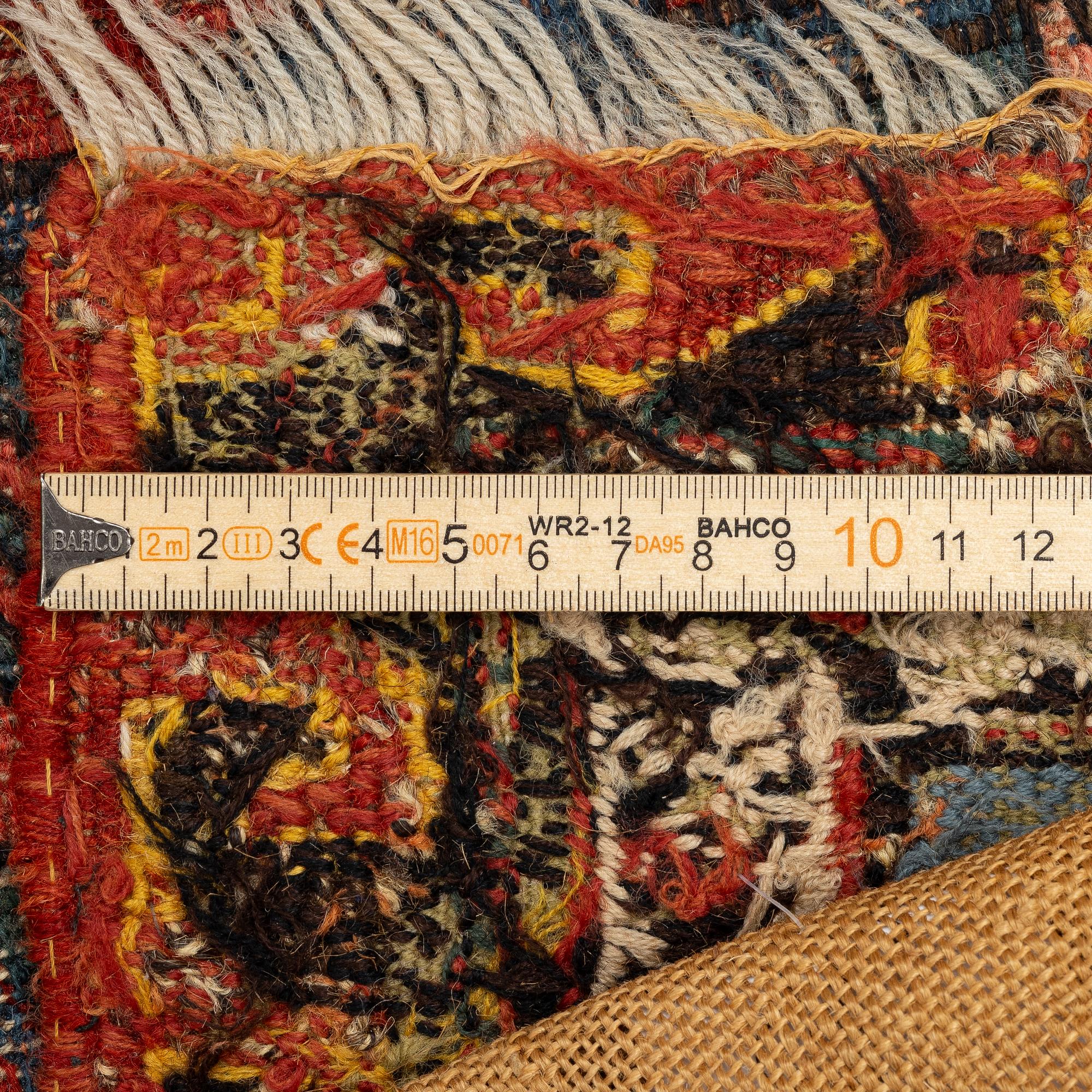 A antique 'Dragon' Soumac, East Caucasus, c. 308 x 240 cm.