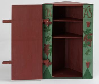 A Carl Malmsten painted pine wall cabinet, dated 1951.