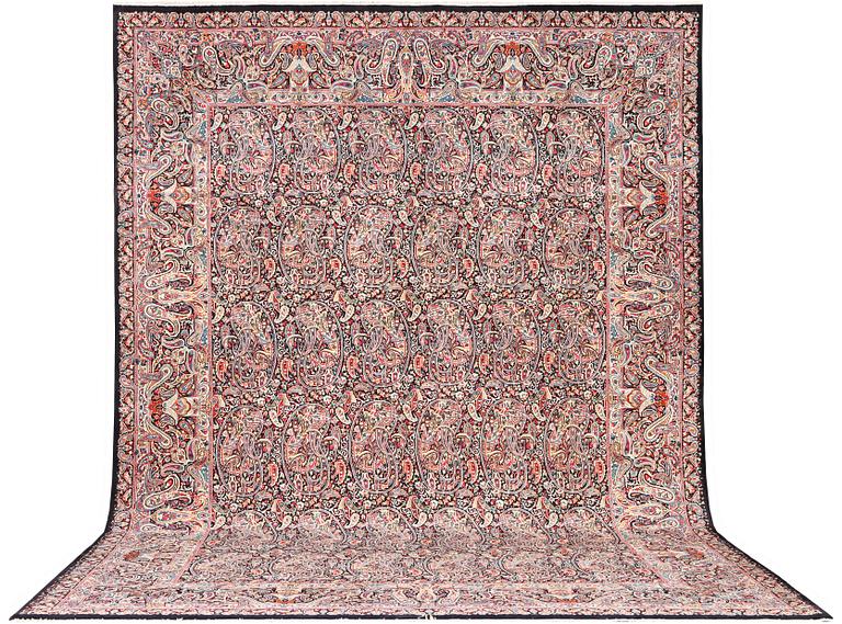 A Boteh pattern Kerman carpet, c. 475 x 342 cm.