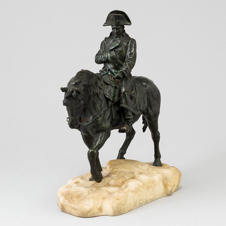 A bronze sculpture of Napoleon on horseback, 20th century mounted on a white marble inscribed "1813" and "Conille".