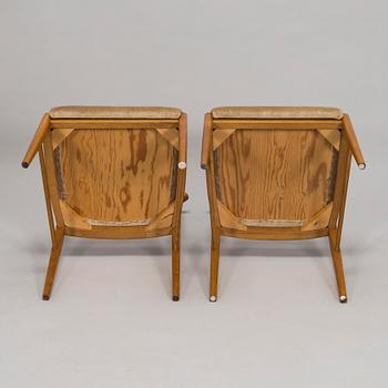 A set of four 1960s oak chairs.