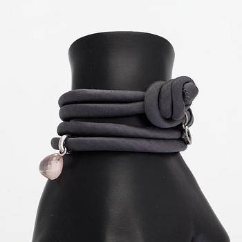 Ole Lynggaard, A silk, rose quartz, diamond 0.015 ct and 18K white gold bracelet. Denmark.