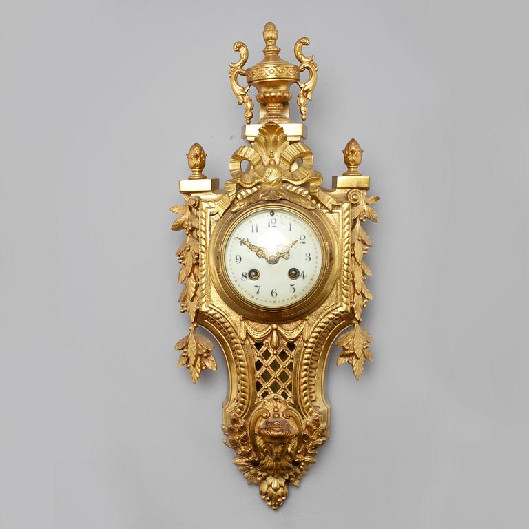 A wall clock in Louis XVI style with clockwork by Japy Frères & Cie, made around year 1900.