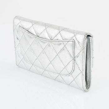 Chanel, a quilted silver leather wallet, 2006-08.