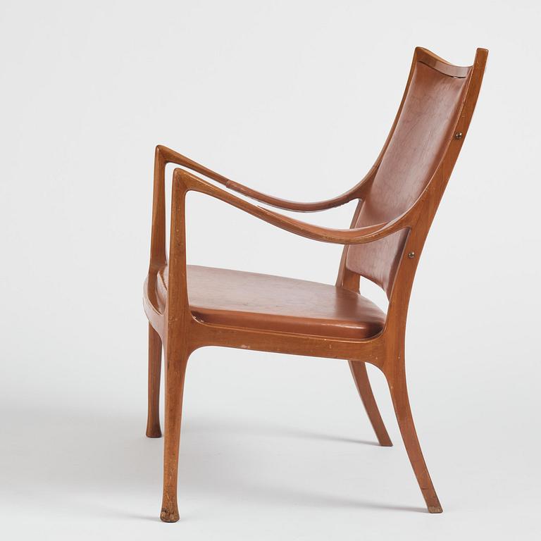 Hans Asplund, a walnut and leather easy chair, Nordiska Kompaniet, ca 1955, for the Nordiska Kompaniet beauty salon.