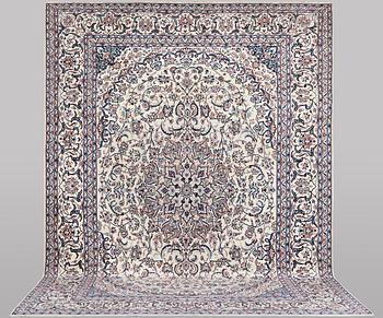 A carpet, Nain, part silk, ca 426 x 309 cm.