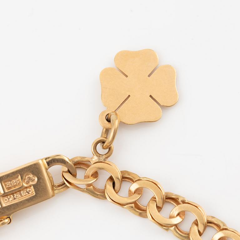 Bracelet, 18K gold, with charms.