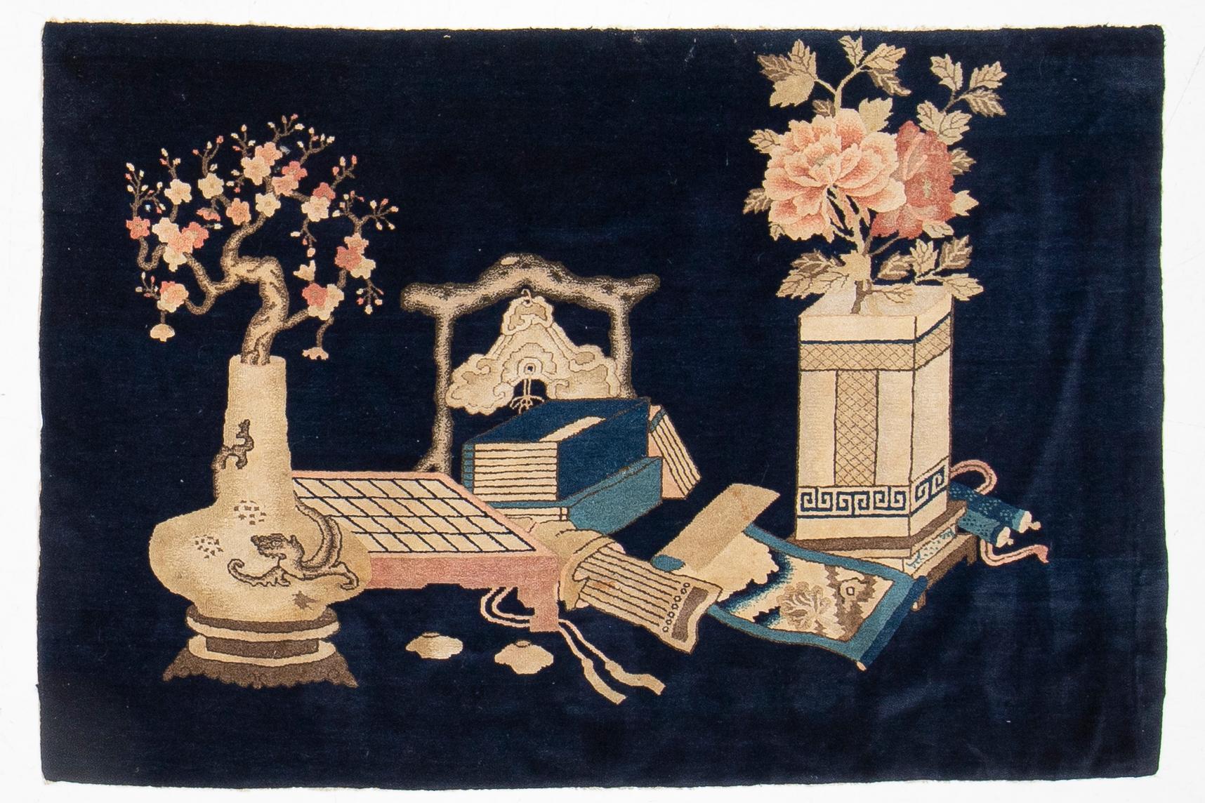 A semi-antique Baotou rug, approx. 185 x 122 cm.