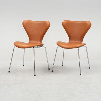 Arne Jacobsen, six leather 'Series 7' chairs, Fritz Hansen, Denmark.