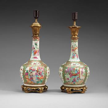 A pair of Canton famille rose lamps / vases, Qing dynasty, 19th century.