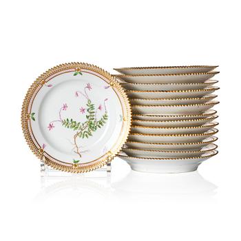 A set of 14 Royal Copenhagen 'Flora Danica' dishes, Denmark, 20th Century.