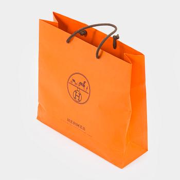 Hermès, a 'Sportsmen' silk scarf.