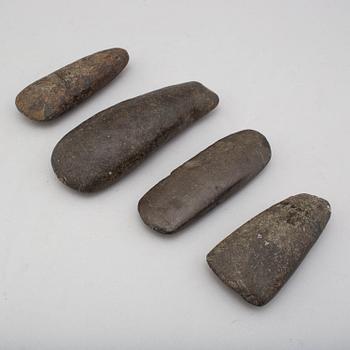 Four neolithic stone axes.