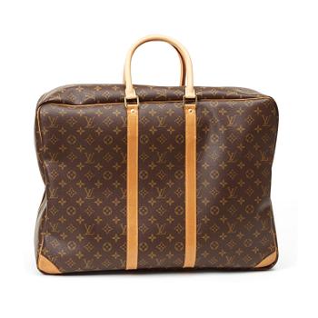 A 1998s monogram canvas travelling bag "Sirius" by Louis Vuitton.