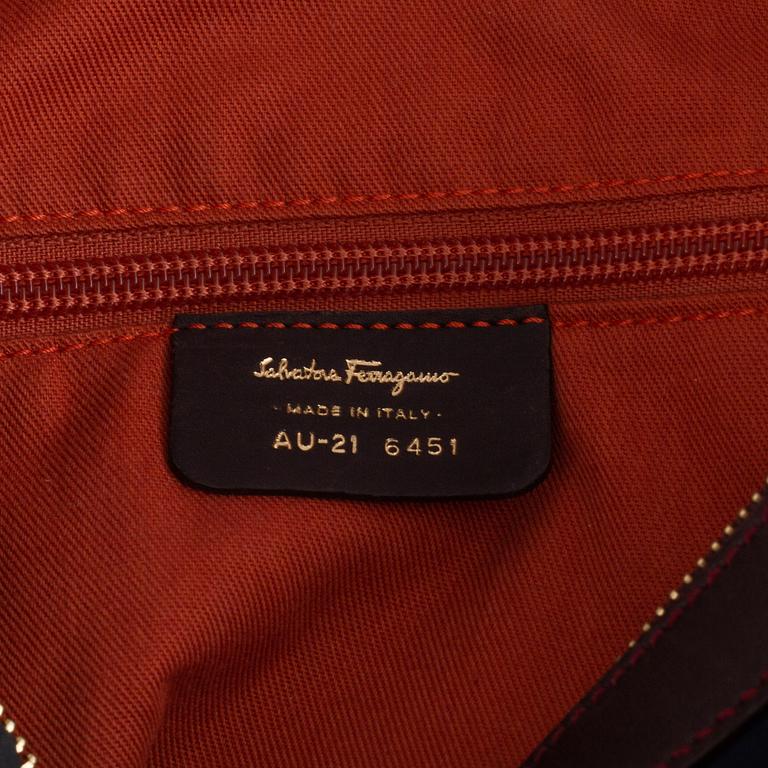 Salvatore Ferragamo,  nylon and leather handbag and wallet.