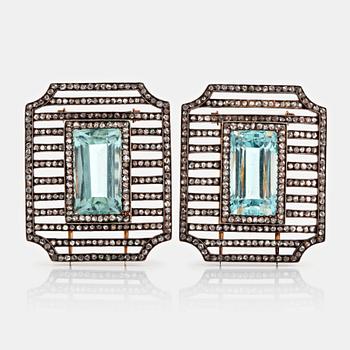 1095. Fabergé double clip brooches, workmaster Albert Holmström, set with aquamarines and rose-cut diamonds.