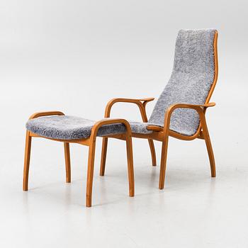 Yngve Ekström, a 'Lamino' armchair with footstool, Swedese, 2004.