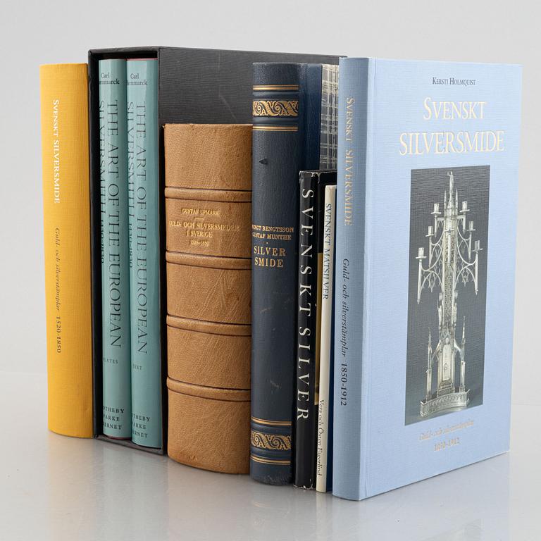 Collection of literature on silver, 8 volumes, including 'Svenskt silversmide 1520-1850'.